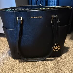 Michael Kors purse zipper broken